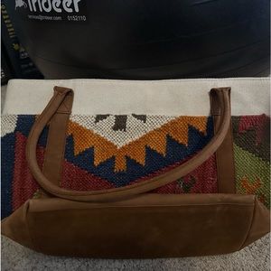 Brand new never used NOONDAY collection bag